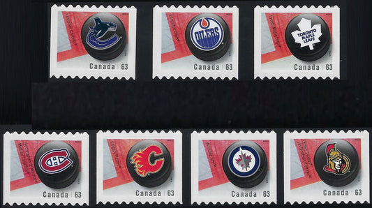 Set of 7 Canadian NHL Hockey Pucks